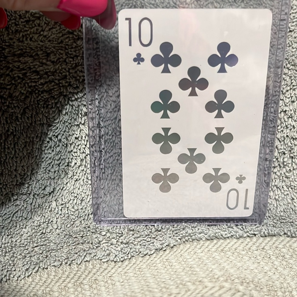 Dior Joy 10♣️playing card looking for his pair or straight comes in hard case